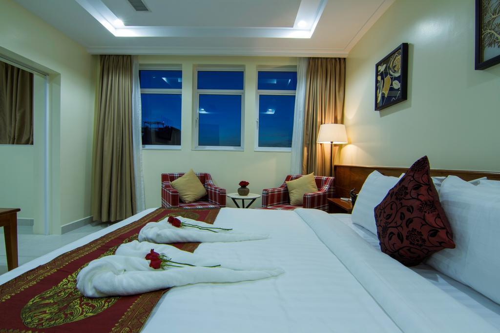 โรงแรมโรส เอมเมอรัลด์ พนมเปญ ภายนอก รูปภาพ